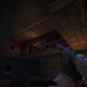 A screenshot of Blood West shows a rifle aimed at an enemy on a balcony.